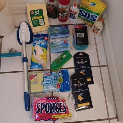 Assortment of cleaning tools - sponges - gloves - SOS pads - glues and more