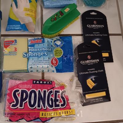 Assortment of cleaning tools - sponges - gloves - SOS pads - glues and more