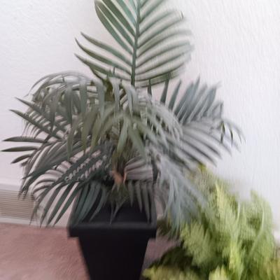 Two faux plants - Fern in basket and Palm in metal pot with light weight flowerpot