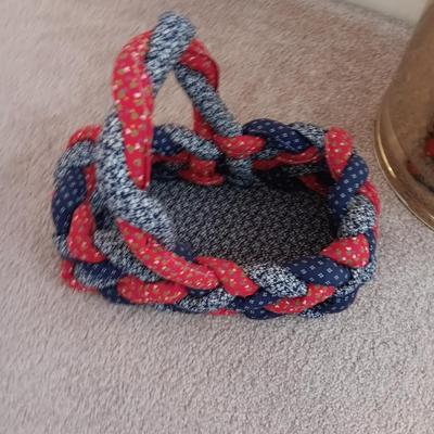Faux palm tree in brass pot and a fabric woven basket
