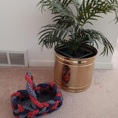 Faux palm tree in brass pot and a fabric woven basket