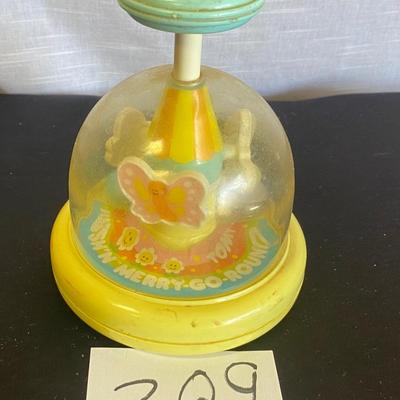Vintage Tomy Push and Go Merry Go Round Toy