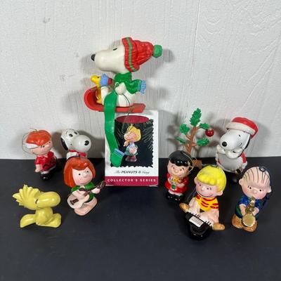 LOT 52G: Peanuts Christmas Collectables - Department 56 Peanuts Christmas Pageant, Hallmark Keepsake Ornaments w/ Displays & More