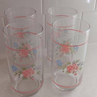 Floral pattern insulated Pheonix carafe with eight Libby pink floral drinking glasses.