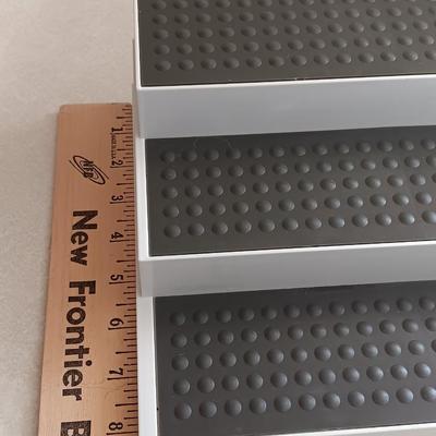Two cupboard organizing platforms for spices and metal salt & pepper shakers