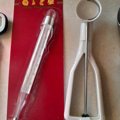 Kitchen Utensils - Meat and candy thermometers - nice ice cream scoop - melon scoop and a wine opener