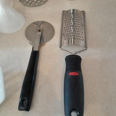 Kitchen Utensils -pizza cutter - garlic grinder - scissors - masher - drink mixing cup and more