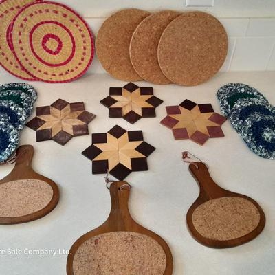 Assortment of Kitchen trivets - wood - cloth - cork - and wicker