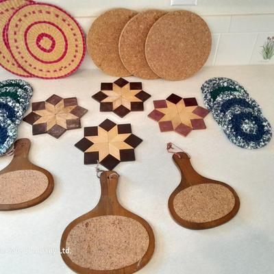 Assortment of Kitchen trivets - wood - cloth - cork - and wicker