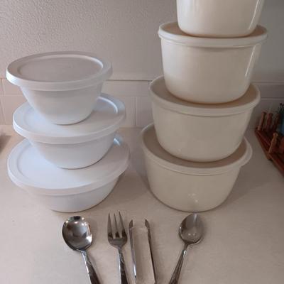 Two sets of plastic food storage containers - nesting - with lids - and serving utensils