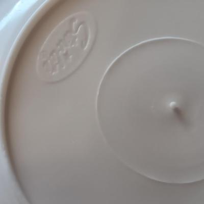 Two sets of plastic food storage containers - nesting - with lids - and serving utensils