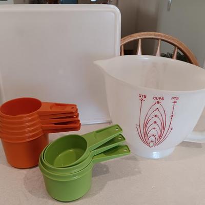 Tupperware - measuring cups - large food storage container - divided dish with dip dish and more.