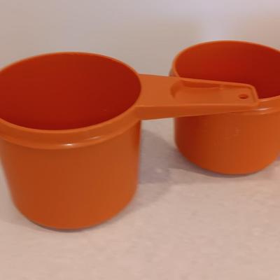 Tupperware - measuring cups - large food storage container - divided dish with dip dish and more.