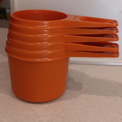 Tupperware - measuring cups - large food storage container - divided dish with dip dish and more.