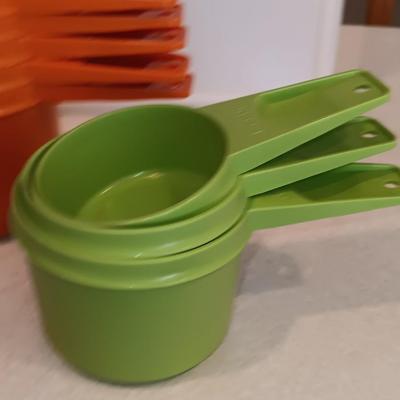 Tupperware - measuring cups - large food storage container - divided dish with dip dish and more.
