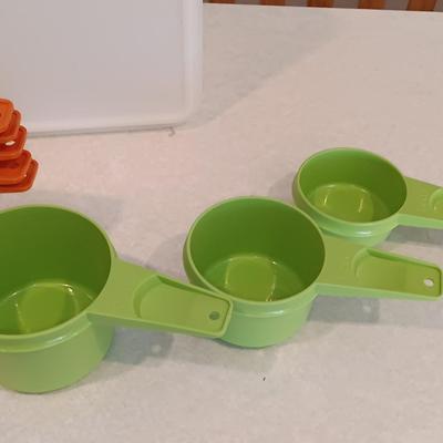 Tupperware - measuring cups - large food storage container - divided dish with dip dish and more.
