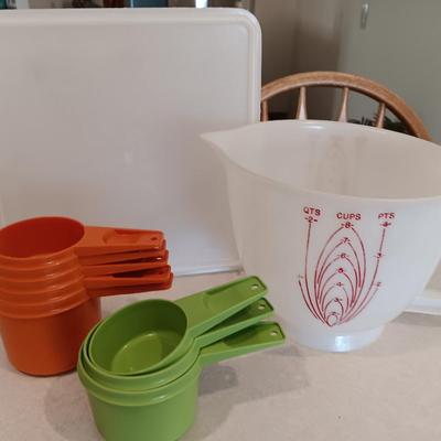 Tupperware - measuring cups - large food storage container - divided dish with dip dish and more.