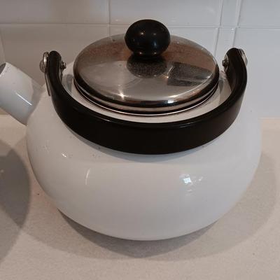 White tea kettle with strainer pan and strainer insert.