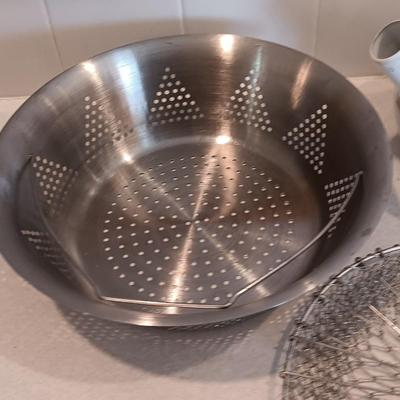 White tea kettle with strainer pan and strainer insert.