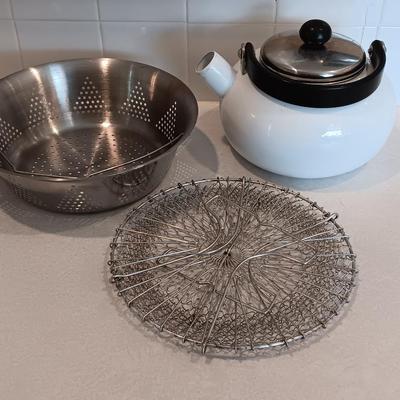 White tea kettle with strainer pan and strainer insert.