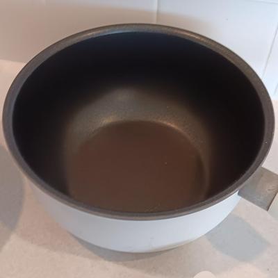 White T-fal cookware Skillet and saucepans