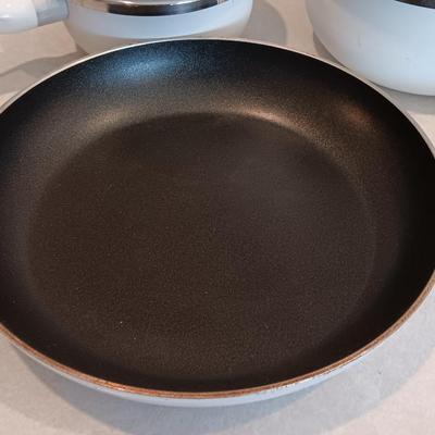 White T-fal cookware Skillet and saucepans