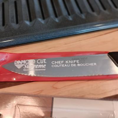 Steak for dinner? Nice broiler pan with a cutting board and two new knives.