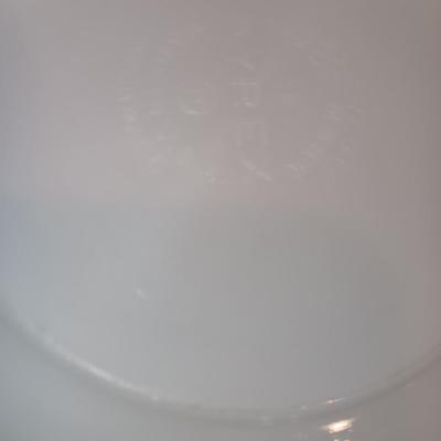 White pyrex bowl with glass lid and an orage luster Fireking handled soup bowl