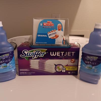 New Swiffer wetjet cleaner and pads and a partial box of Mr. clean magic erasers