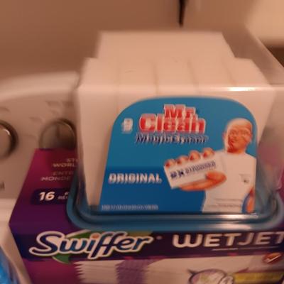 New Swiffer wetjet cleaner and pads and a partial box of Mr. clean magic erasers