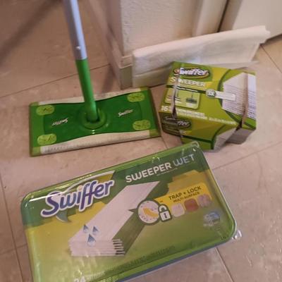 Swiffer sweeper wet mop with swiffer pads