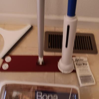 Bona mop with partial box of Bona wipes for hardwood floors and a super mop