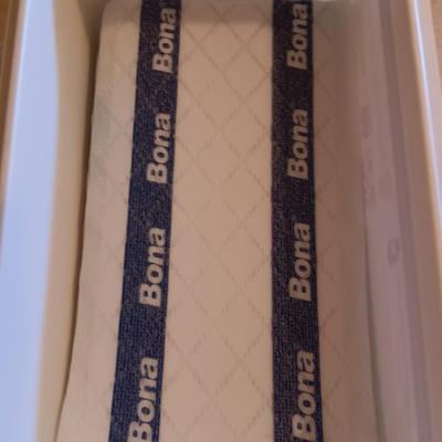 Bona mop with partial box of Bona wipes for hardwood floors and a super mop