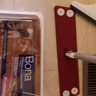 Bona mop with partial box of Bona wipes for hardwood floors and a super mop