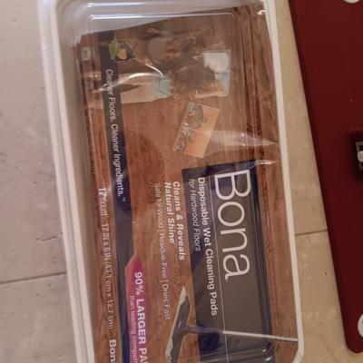 Bona mop with partial box of Bona wipes for hardwood floors and a super mop