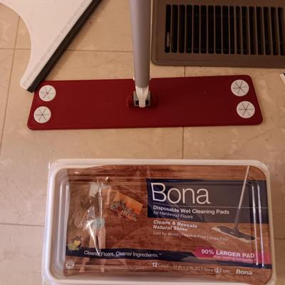 Bona mop with partial box of Bona wipes for hardwood floors and a super mop