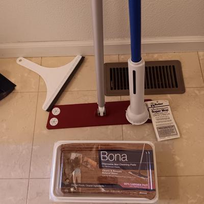 Bona mop with partial box of Bona wipes for hardwood floors and a super mop