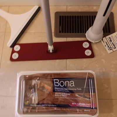 Bona mop with partial box of Bona wipes for hardwood floors and a super mop