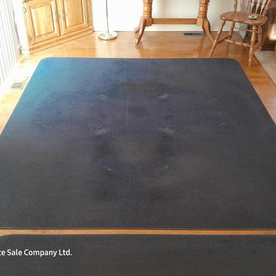 Large blue area rug with matching runner and a floral kitchen rug