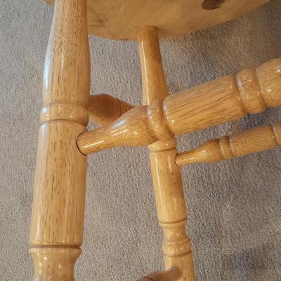 Two nice oak high back swivel bar stools