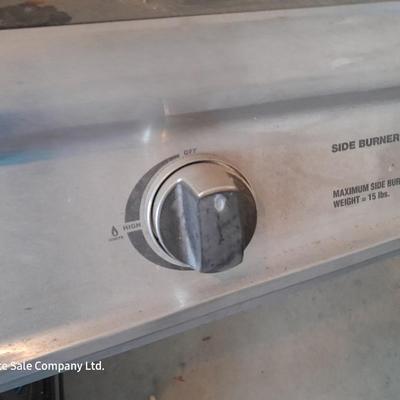 Nice Stainless Brinkman grill with propane bottle and cover