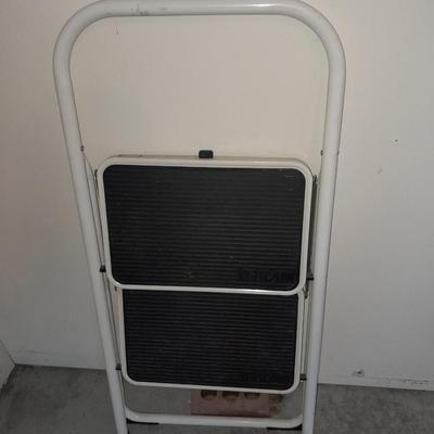 Folding two - step Tricam brand stool and a nice plastic one step stool