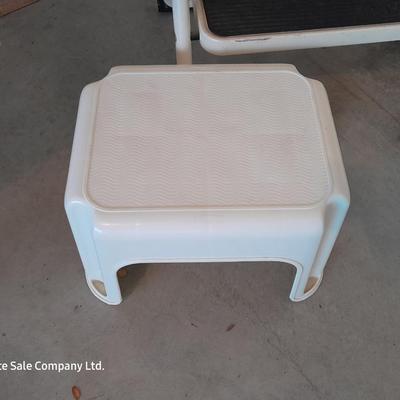 Folding two - step Tricam brand stool and a nice plastic one step stool