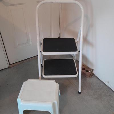 Folding two - step Tricam brand stool and a nice plastic one step stool