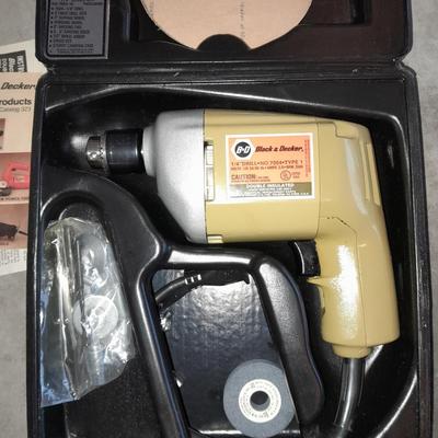 Black and Decker 1/4" electric drill with case and accessories