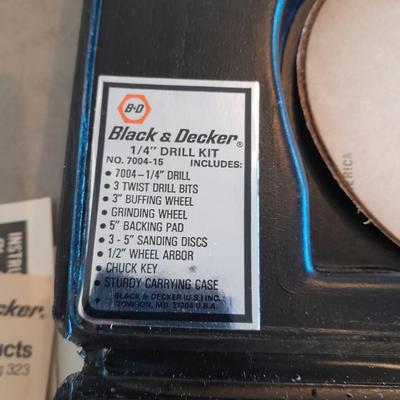 Black and Decker 1/4" electric drill with case and accessories