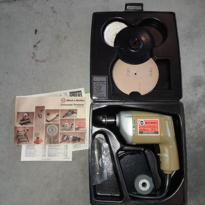 Black and Decker 1/4" electric drill with case and accessories