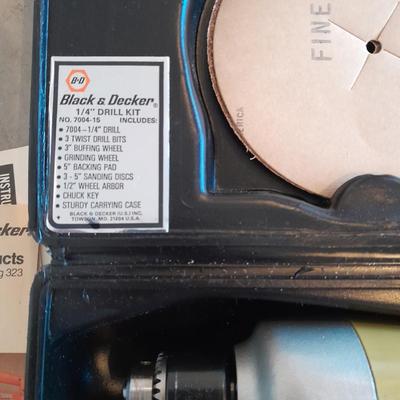 Black and Decker 1/4" electric drill with case and accessories