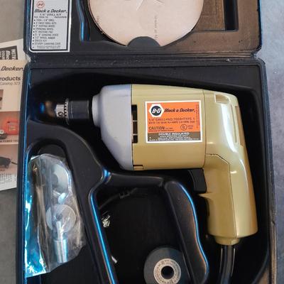 Black and Decker 1/4" electric drill with case and accessories