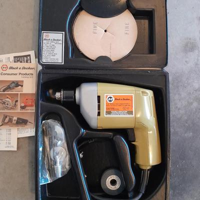 Black and Decker 1/4" electric drill with case and accessories